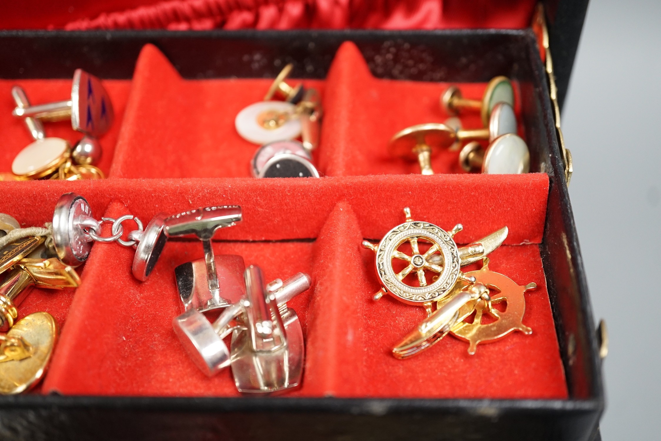 A group of assorted costume cufflinks, etc.